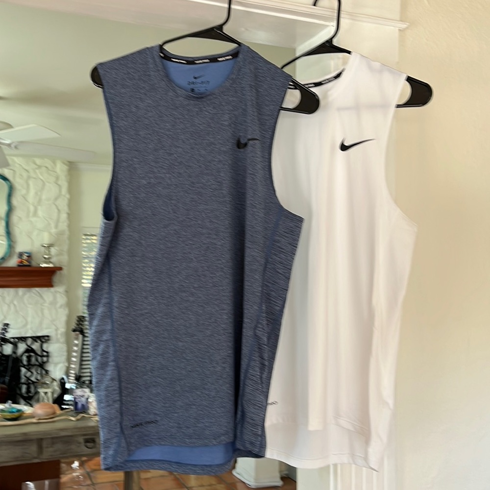 Two identical Nike dryfit fitness tank tops. Size medium